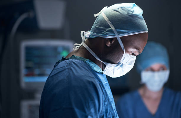 Shot of a surgeon in an operating theatre